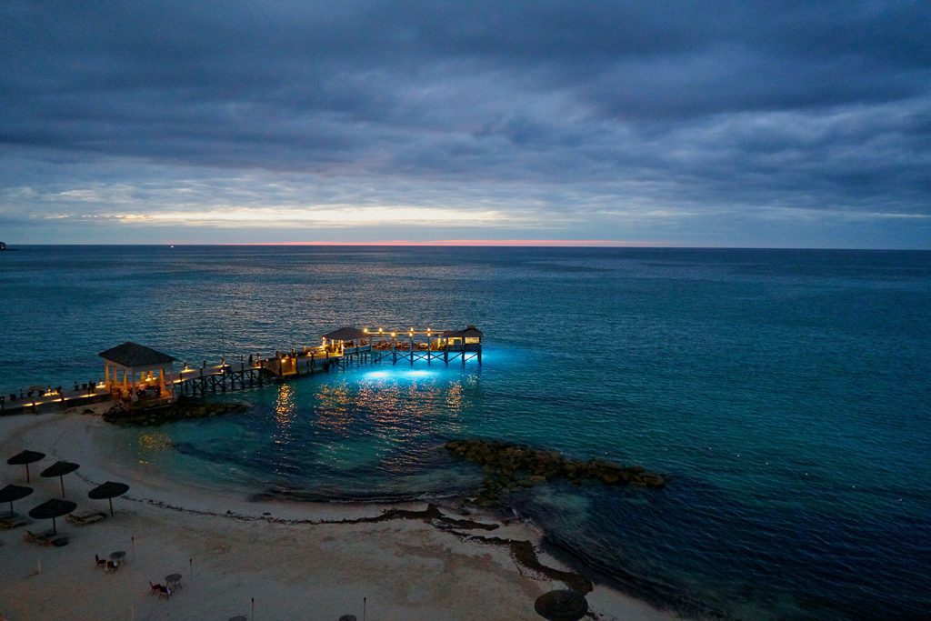 Bahamas fishing charters and Bahamas deep sea fishing from a dock leading into clear ocean water
